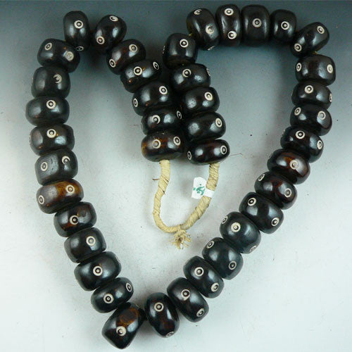 Cow Bone with carved Circles - Dark